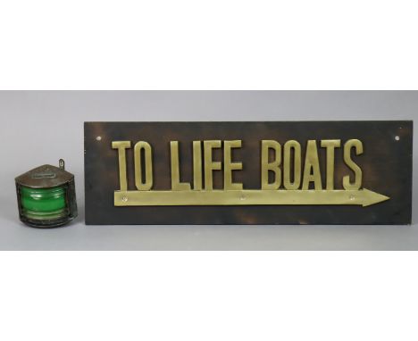 A rectangular sign “TO LIFE BOATS”, 64cm x 20cm; &amp; a “Starboard” ships lantern, 9cm high. 
