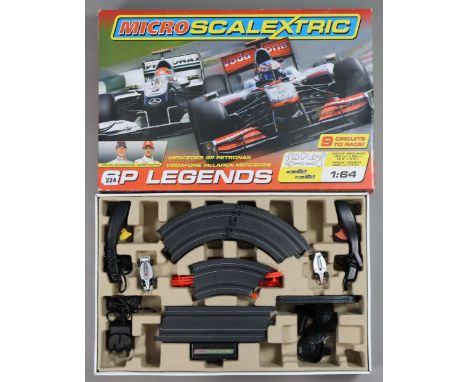 A Micro-Scalextric “GP Legends” racing car set, boxed. 
