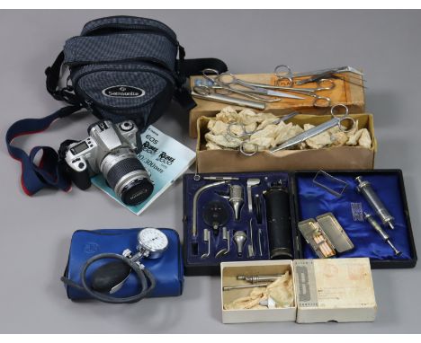 A Canon “EOS 300” camera, with case; &amp; various vintage medical instruments. 