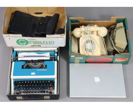 An Underwood “315” portable typewriter; a Psion organiser, each with case; a Mac Book Pro laptop; &amp; four vintage telephon