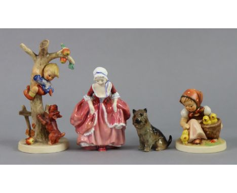 A Royal Doulton figure “Goody Two Shoes” (HN 2037); a Royal Doulton dog character model (No. 766); &amp; two Goebel Hummel fi