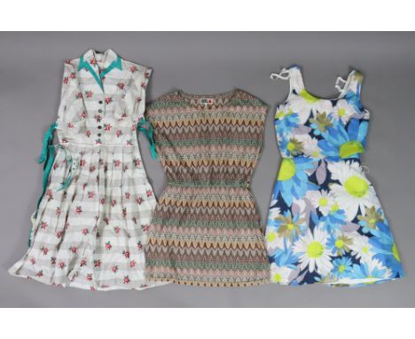 Seven various vintage ladies’ dresses; two vintage skirts; a woman’s jacket; &amp; two scarfs.