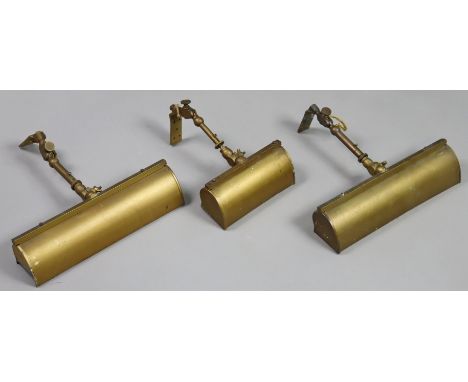Three vintage “Whiteway” reflector brass picture lights each with an articulated arm, various sizes.