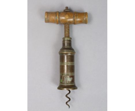 A vintage Thomason Dowler-type brass corkscrew with a turned treen handle (split to handle), 18cm high. 