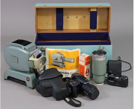 An Olympus “IS-3000” camera; another Olympus camera; &amp; a Leitz Wetzler “Prado” slide projector, all cased. 