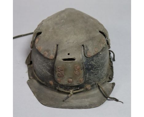 A vintage miners helmet. 