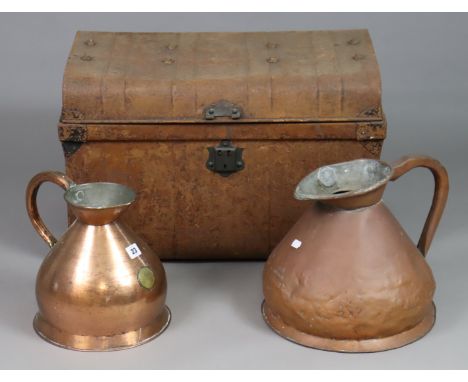 A vintage copper one gallon measuring jug; a ditto 2 gallon measuring jug; &amp; a tin travelling trunk, 61cm wide. 