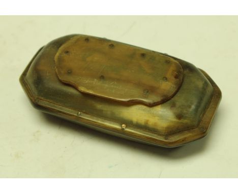 An 18th/19th century horn snuff box of cushioned canted rectangular form, hinged lid, 9.5cm wide, c.1800