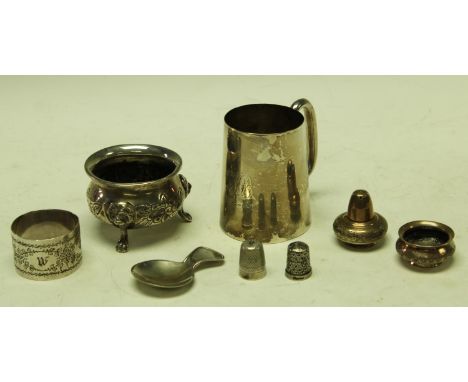 A silver Christening beaker, Birmingham 1901; an Edwardian silver salt, hallmarked; a silver caddy spoon, Birmingham 1988; a 