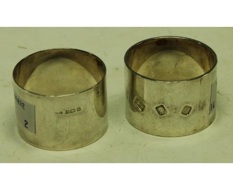 A substantial silver napkin ring, London 1971, 66g; another, 32g (2)