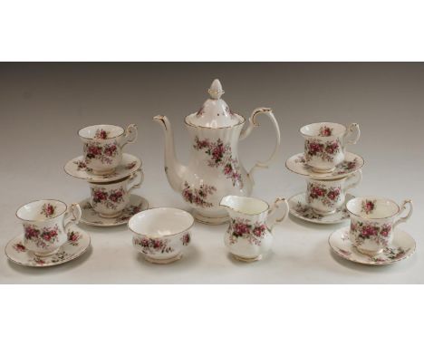 A Royal Albert Lavender Rose pattern coffee set for six, coffee pot, cream jug and sugar bowl, six coffee cups and saucers