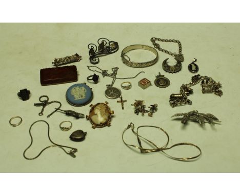 A sterling silver fob; sterling silver bangle; charm bracelet; charms; late 19th century silver crescent brooch; a 9ct gold c