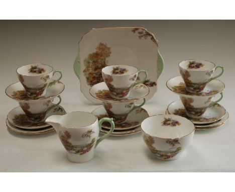 A Shelley Heather pattern tea service for six comprising cake plate, cream jug, sugar bowl, side plates, cups and saucers