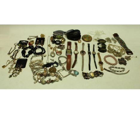 A Gucci lady's fashion watch; a pair of Ferarri folding sunglasses, soft pouch, c.1970s; a Darling powder compact, c.1950s; c