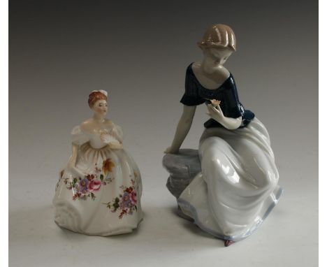 A Spanish porcelain Nao figure, Girl with a Rose, 30cm, printed mark; a Royal Doulton figure, Marilyn HN3002 (2)