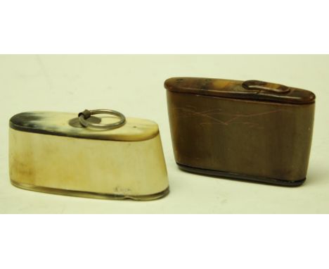 A 19th century rectangular horn snuff box with push on cover, 9cm wide, c.1880; another with pivoting cover, 9cm wide, c.1820