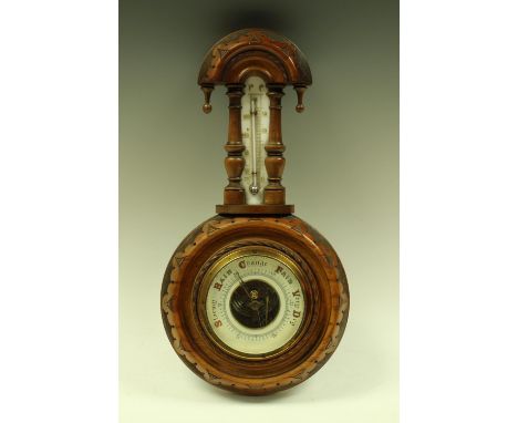 A late 19th century mahogany aneroid wall barometer with thermometer, Made in Germany, number 503, 34cm