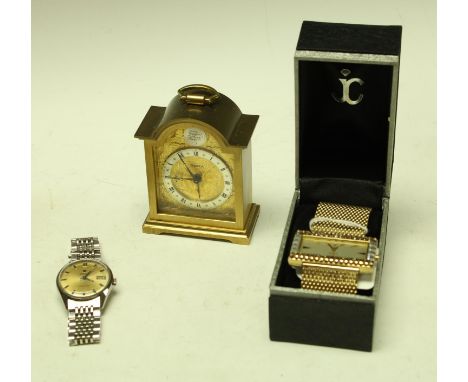 A gentleman's Roamer Vanguard stainless steel watch, champagne dial, baton indicators, date aperture, integral bracelet strap