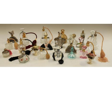 An Art Deco style faceted glass scent bottle and stopper; others similar; a glass scent atomiser; a butterfly scent bottle; a