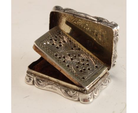 A Victorian silver shaped rectangular viniagrette, vacant cartouche and suspension ring, Wilmot &amp; Roberts, Birmingham 184