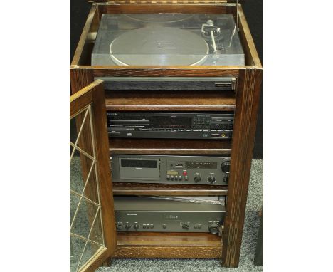 A stacking stereo system comprising a Nad stereo amplifier 3130; a Nad stereo casette deck 6325; a Philips Compact Disc plate
