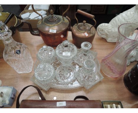 A selection of glass dressing table pots, a Stuart Crystal decanter and a Caithness style vase