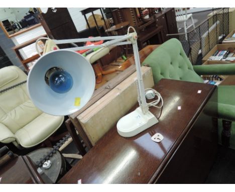 An Angle poise desk lamp