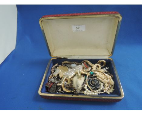 A selection of costume jewellery including diamante lion, rolled gold hinged bangle etc