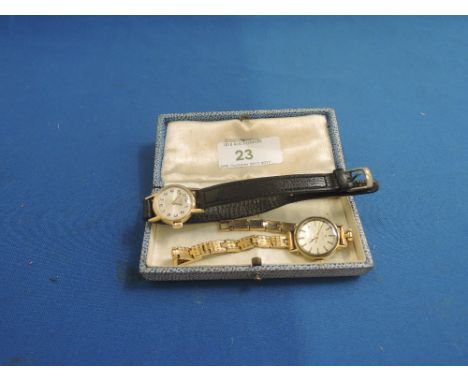 A lady's Tissot wrist watch having baton numeral dial on gold plated articulated strap and a Rotary wrist watch having Arabic