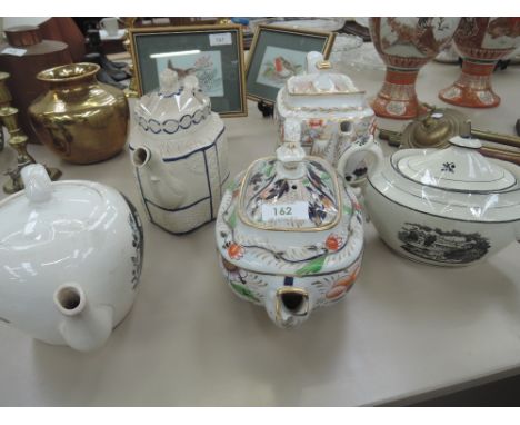 A selection of vintage and antique tea pots including Hadfield Rockferry, Spode etc