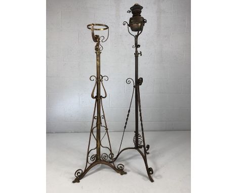 Pair of standard oil lamp stands, one with lamp