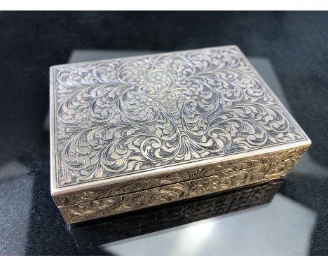 Silver compact and cigarette case marked 800 with all over design and a hidden button release mechanism (approx 167g)