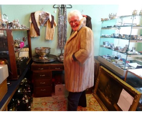 A lady's 3/4 length mink fur coat, bearing the label R. C. Winterson Limited, together with a lady's silk dressing gown.