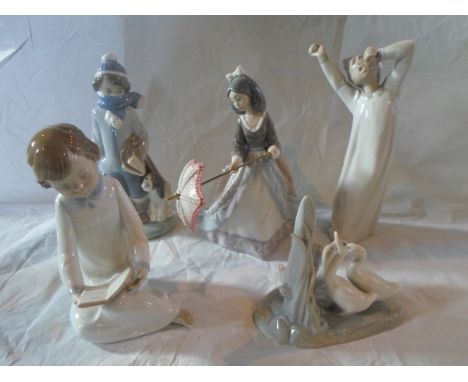 A Lladro figurine of a girl holding a parasol (5210), together with two further Lladro figurines and two Nao figurines.