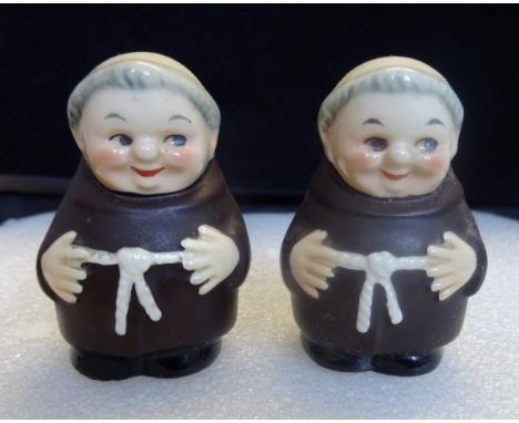A pair of Goebel ceramic peppers, modelled as monks (6cm).