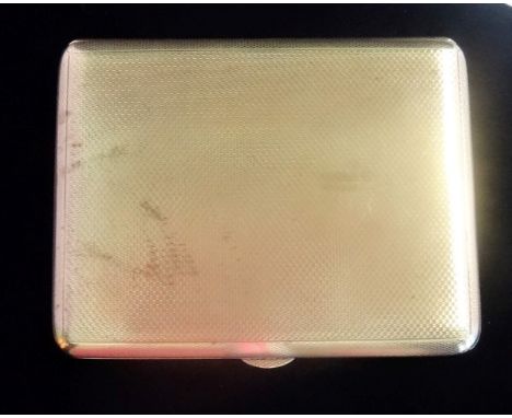 A 9ct gold cigarette case, with engine turned decoration, 141 grams.
