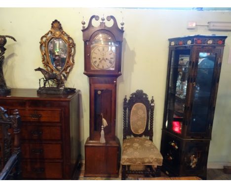 An oak longcase clock, the dials signed Thomas Wilson, Spalding, the eight day movement striking on a bell, the painted dial 