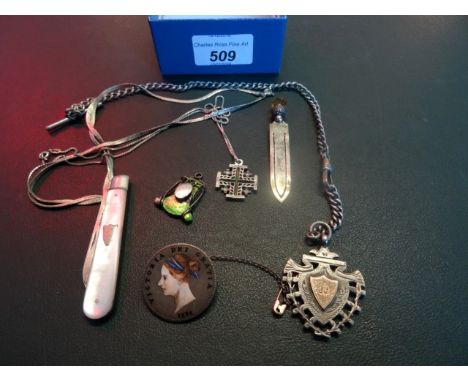 A mixed lot to include: a silver fob medal and chain, a mother of pearl handled fruit knife, having a silver blade, a silver 