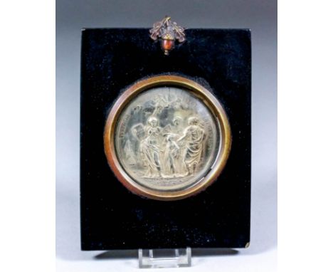 A late 17th Century silvery metal badge of the mathematical scholars of Christ's Hospital, designed by J. A. Roettier, showin