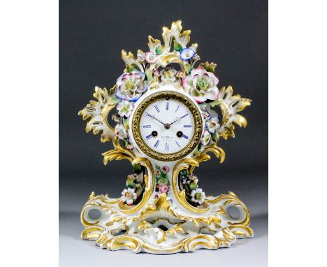 A 19th Century French porcelain cased mantel clock by Henri Marc of Paris, No. 18454, the 2.75ins diameter white enamel dial 