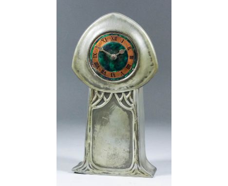 An early 20th Century "Tudric" style pewter-cased mantel timepiece, attributed to Archibald Knox, the 2.5ins diameter enamel 