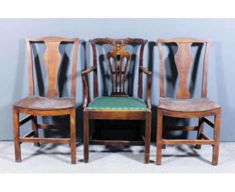 A pair of 18th Century ash dining chairs of "Country Chippendale" design with shaped crest rails, solid vase pattern splats a