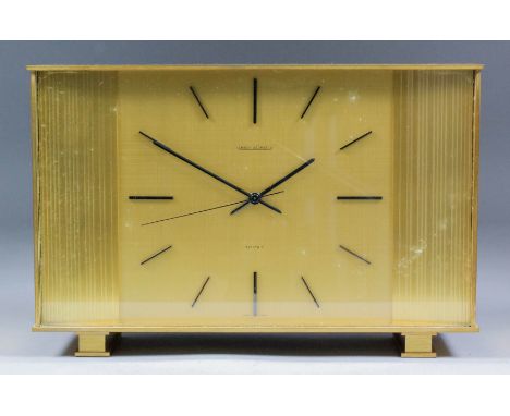 A Jaeger-LeCoultre gilt metal cased electric timepiece, the rectangular dial with oxidised metal numeral batons, to the batte