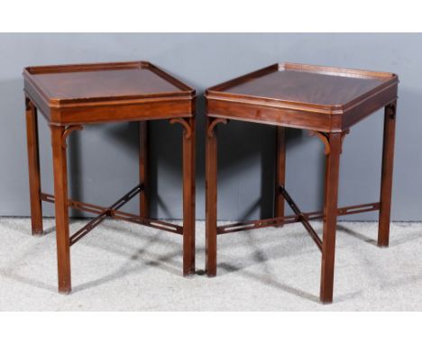 A pair of modern mahogany rectangular tray top lamp tables of "Chippendale" design by Arthur Brett &amp; Sons, with canted co