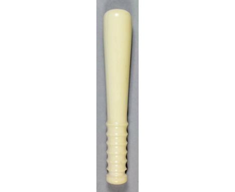 A 19th/20th Century turned ivory miniature truncheon with ribbed handle, 7.25ins