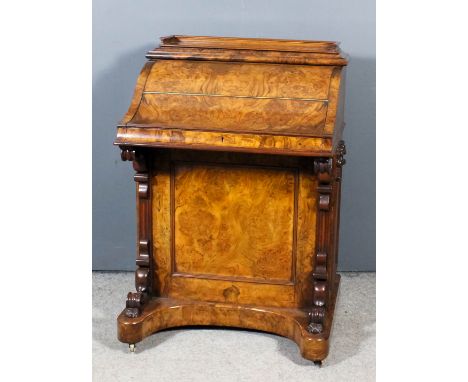 A Victorian figured walnut harlequin Davenport by Wilkinson &amp; Son, 8 Old Bond Street, with tray top rising stationery rac