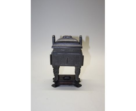 A Chinese bronze fangding, eight character archaistic mark, 19.5cm high, with shaped hardwood stand and cover. Condition Repo