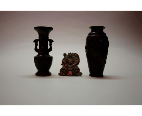 A Japanese bronze vase, Meiji, relief decorated with birds and flowering plants, 15cm high; together with another Japanese br