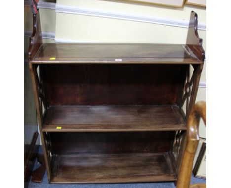 A Chinese hardwood hanging three tier wall shelf, 89cm wide. 