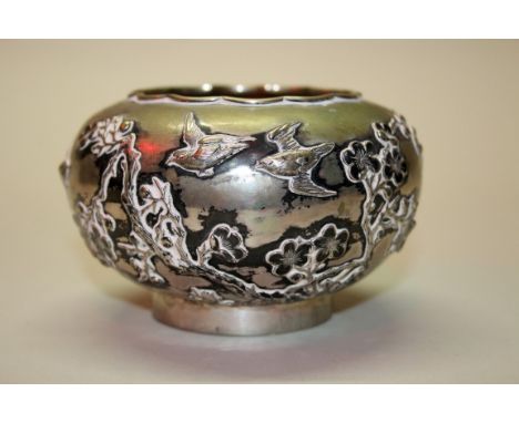 A Chinese silver bowl, by Luen-Wo, Shanghai, with lobed rim and relief decorated with birds and flowering prunus, 11.5cm diam